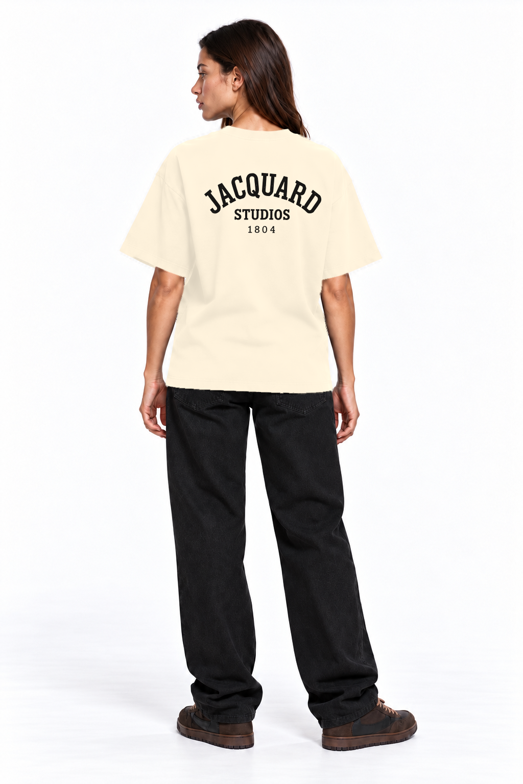 Back view of a second model wearing the JacquardStudios 1804 T-Shirt in Apricot