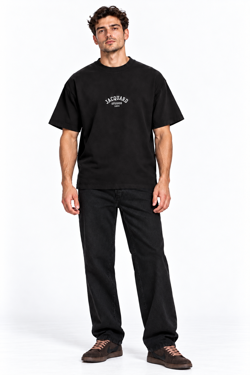 Front view of a model wearing the JacquardStudios 1804 T-Shirt in Black