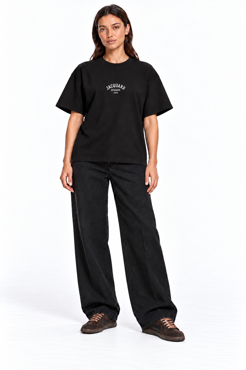 Front view of a second model wearing the JacquardStudios 1804 T-Shirt in Black