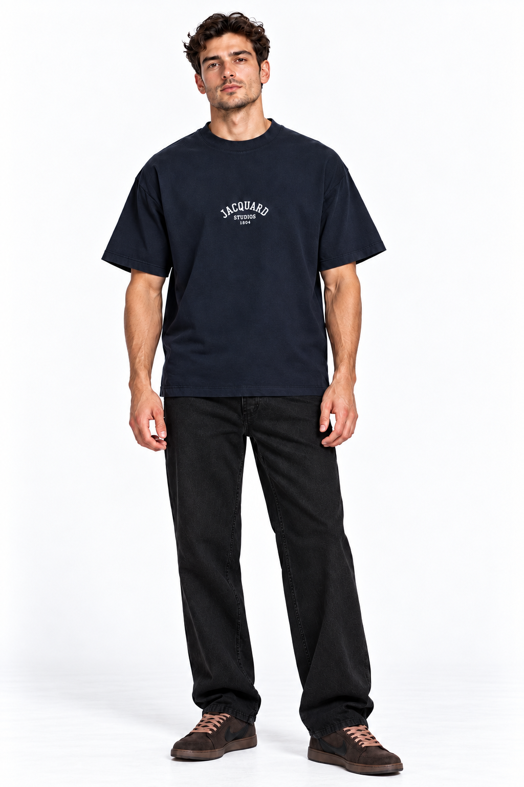 Front view of a model wearing the JacquardStudios 1804 T-Shirt in Navy Blue