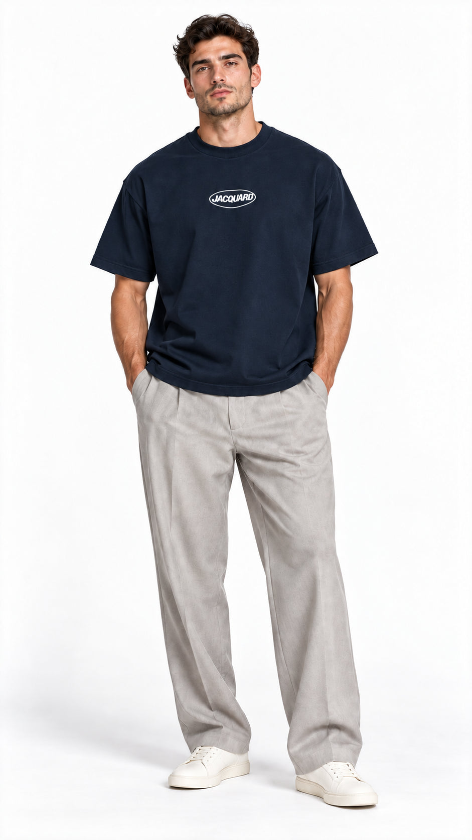 Front view of a model wearing the JacquardStudios Logo T-Shirt in Navy Blue