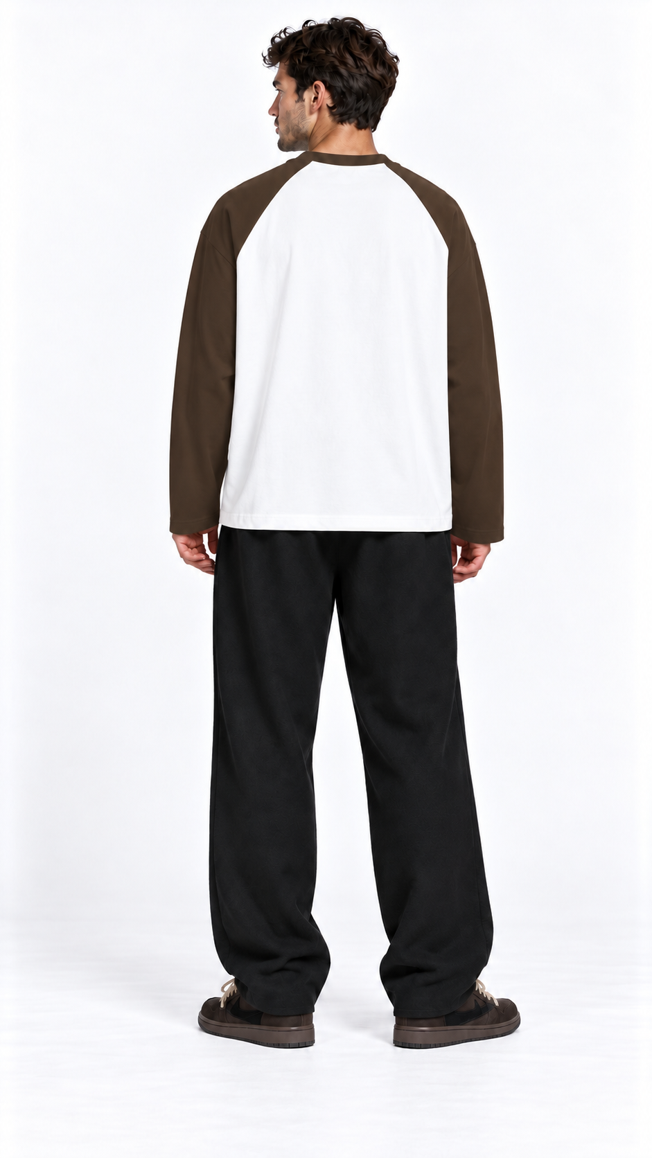 Back view of a model wearing the JacquardStudios Club Raglan Longsleeve in White with Coffee
