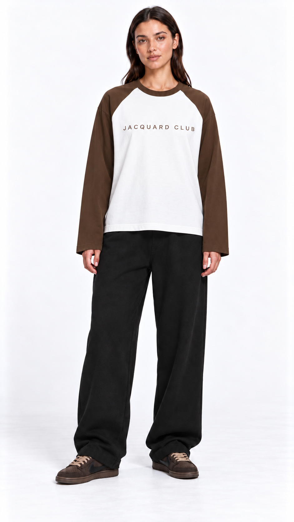 Front view of a second model wearing the JacquardStudios Club Raglan Longsleeve in White with Coffee