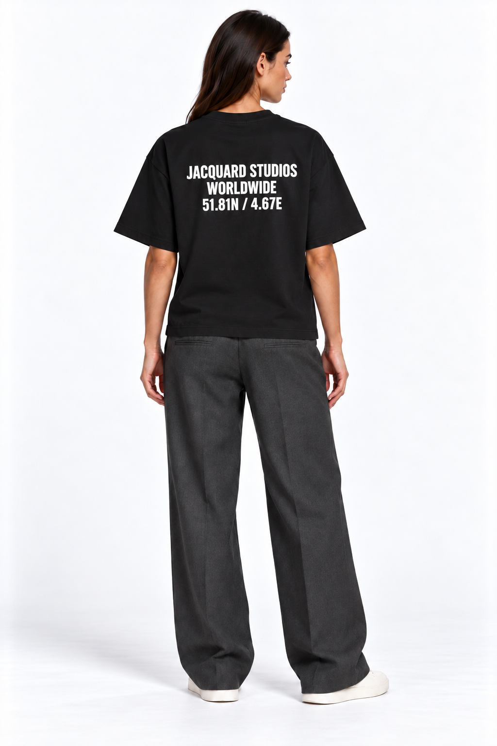 Back view of a second model wearing the JacquardStudios Coordinates T-Shirt in Black