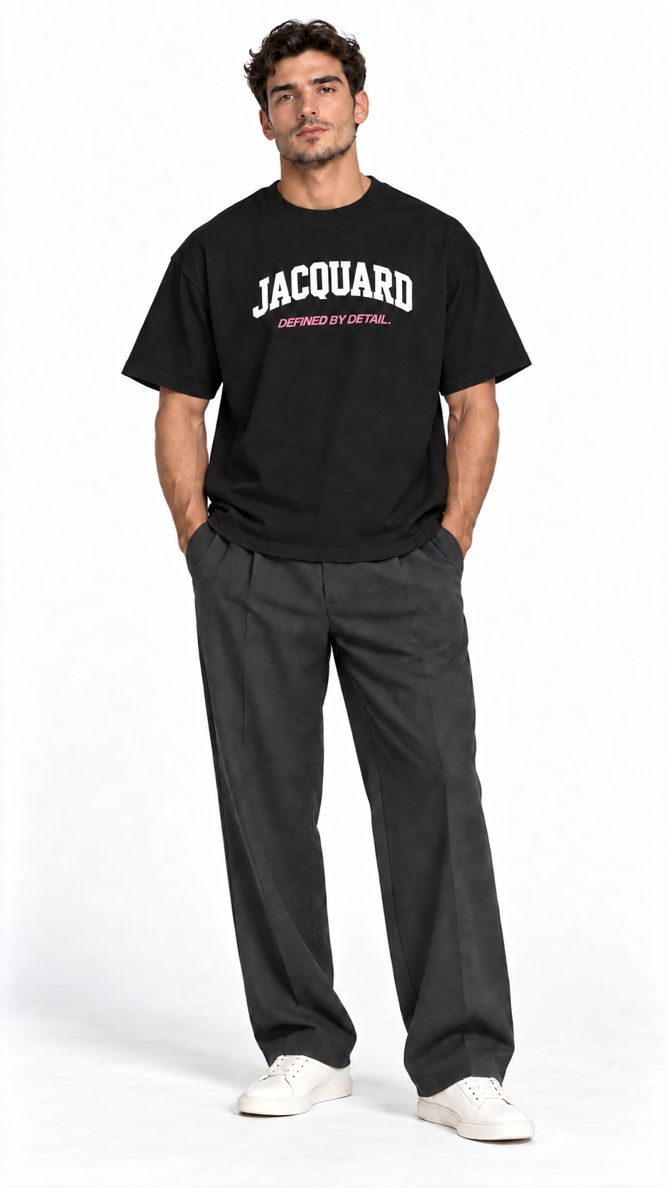 Front view of a model wearing the JacquardStudios Defined by T-Shirt in Black