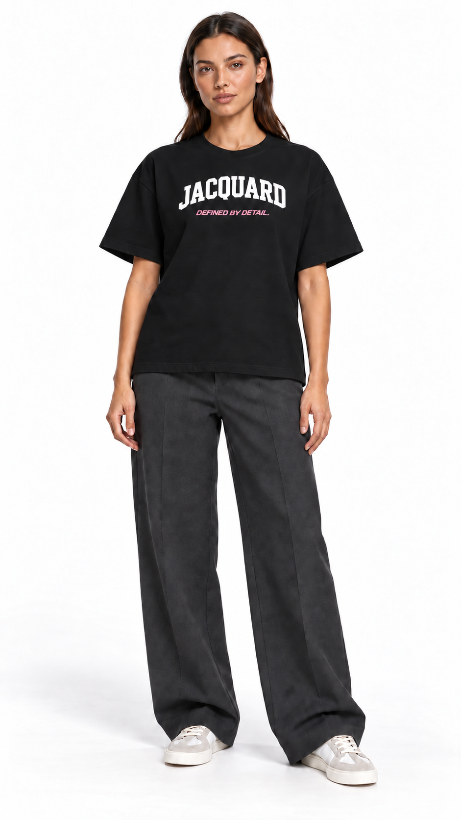Front view of a second model wearing the JacquardStudios Defined by T-Shirt in Black