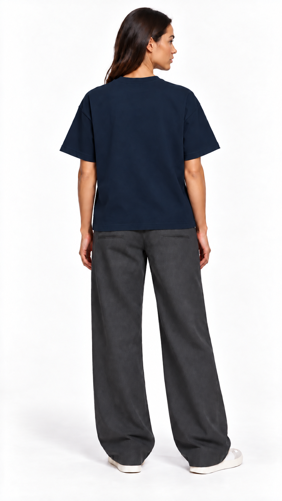 Back view of a second model wearing the JacquardStudios Defined by T-Shirt in Navy Blue