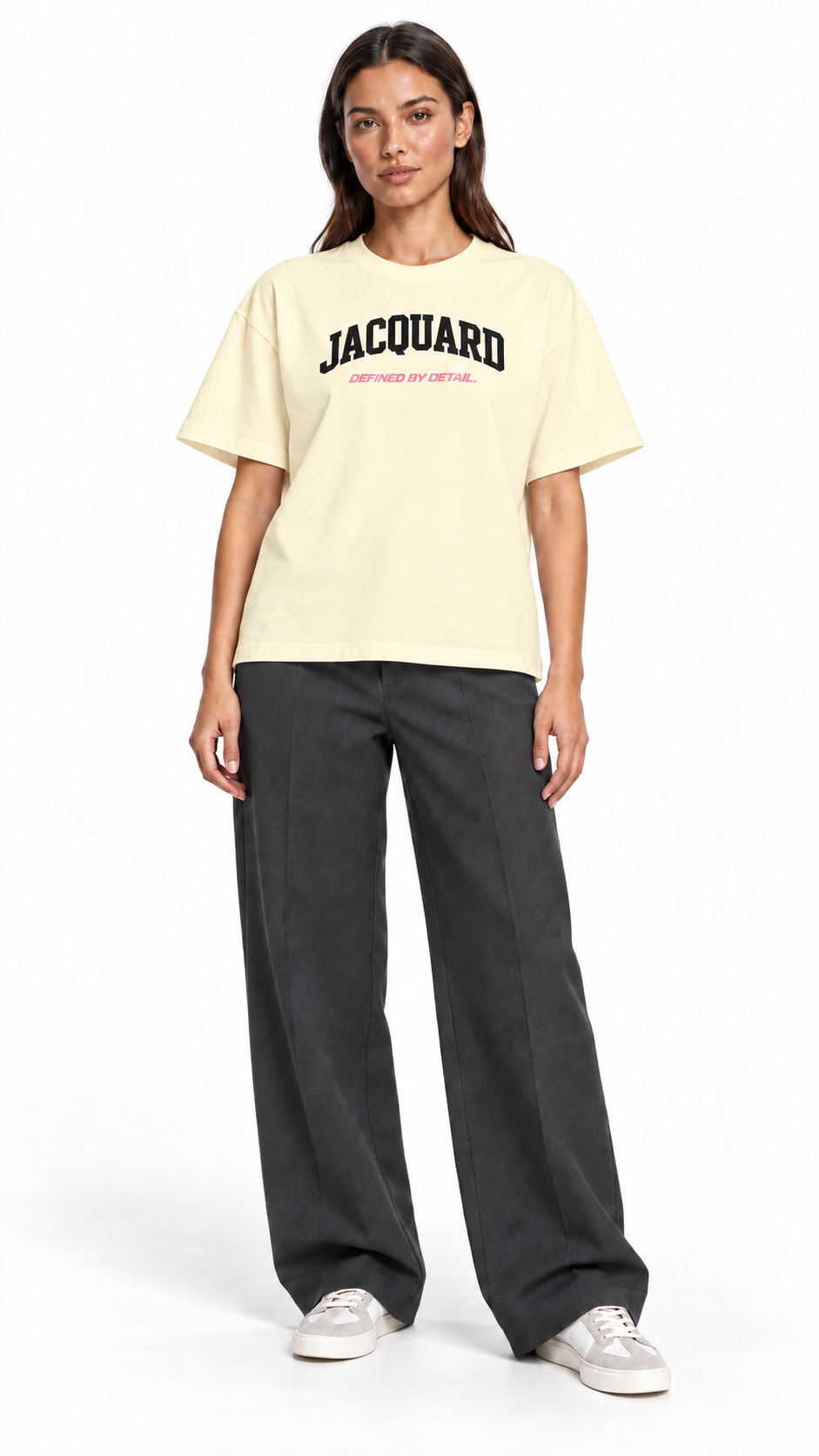 Front view of a second model wearing the JacquardStudios Defined by T-Shirt in Apricot