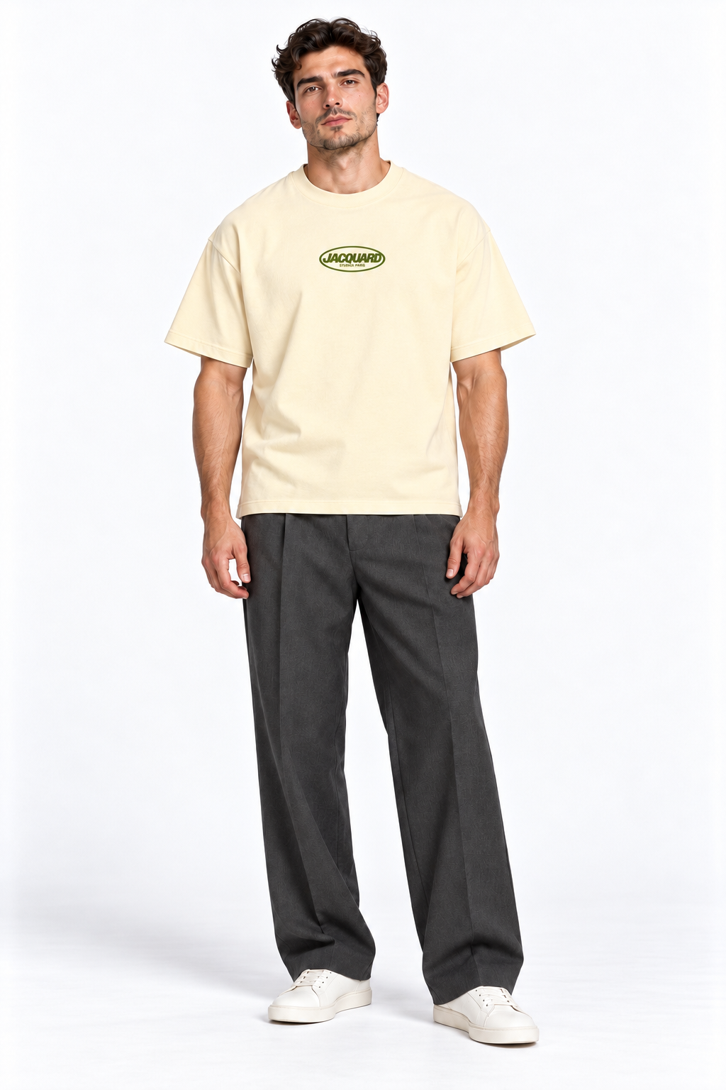 Front view of a model wearing the JacquardStudios Logo T-Shirt in Apricot