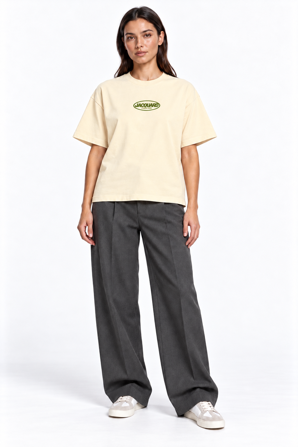 Front view of a second model wearing the JacquardStudios Logo T-Shirt in Apricot