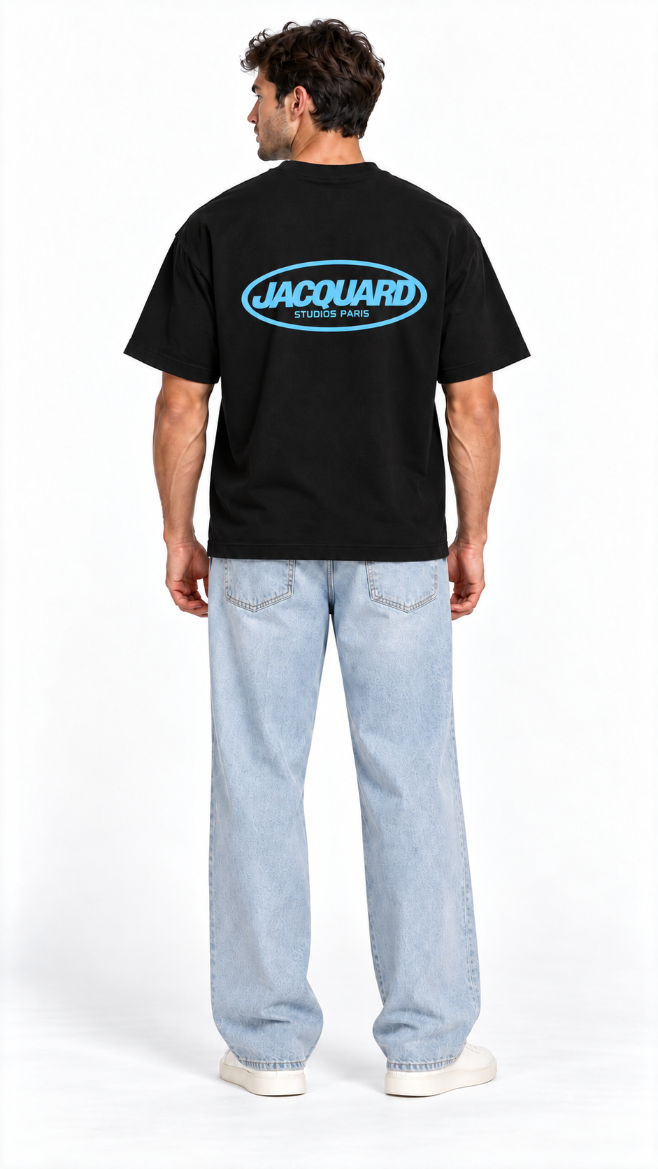 Back view of a model wearing the JacquardStudios Logo T-Shirt in Black