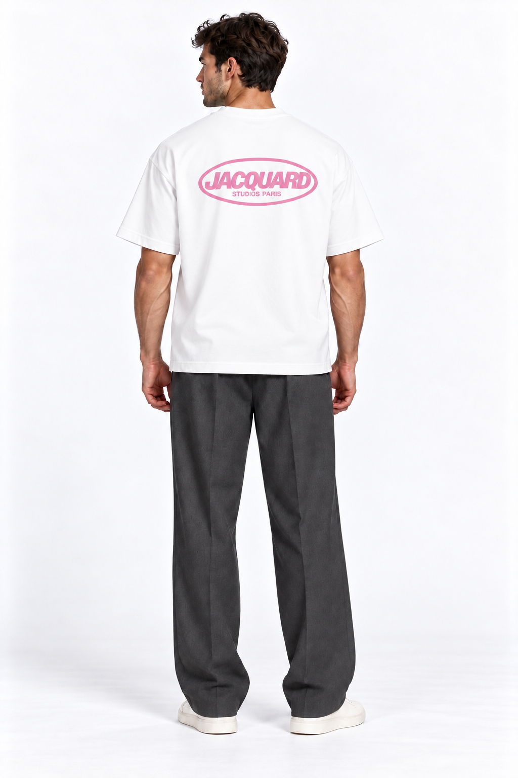 Back view of a model wearing the JacquardStudios Logo T-Shirt in White
