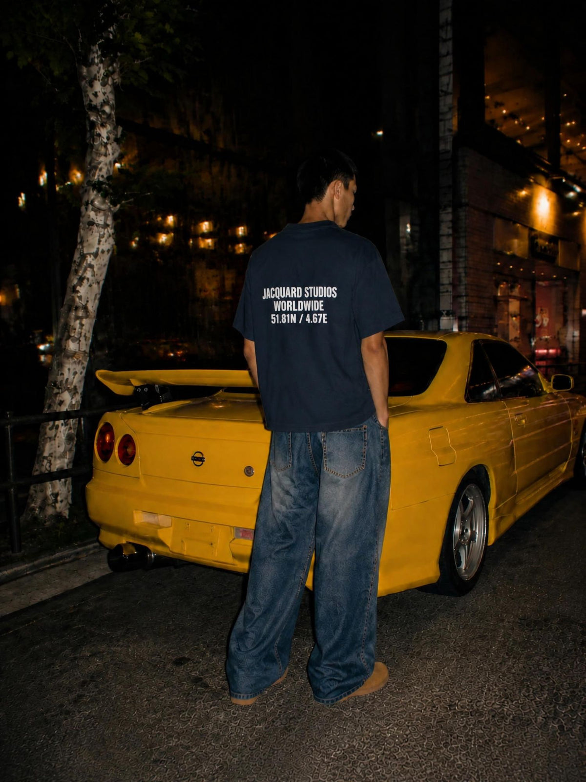 JacquardStudios Night Drive lookbook: back of the navy T-shirt with the JacquardStudios Worldwide 51.81N / 4.67E print