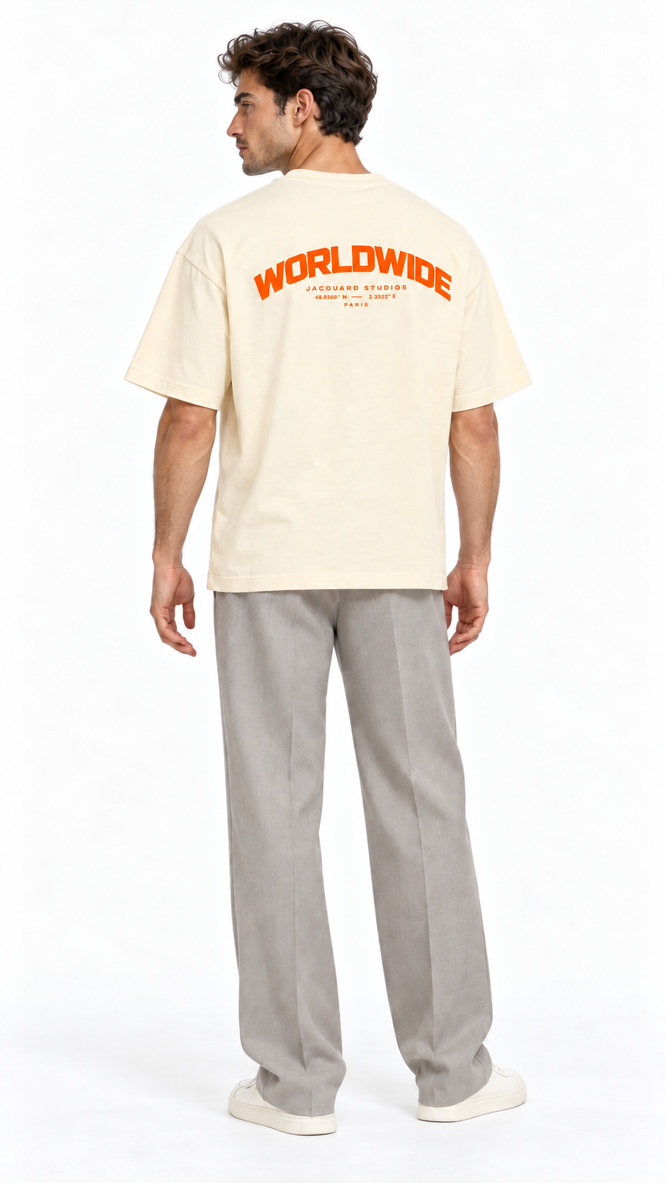 Back view of a model wearing the JacquardStudios Worldwide Orange T-Shirt in Apricot