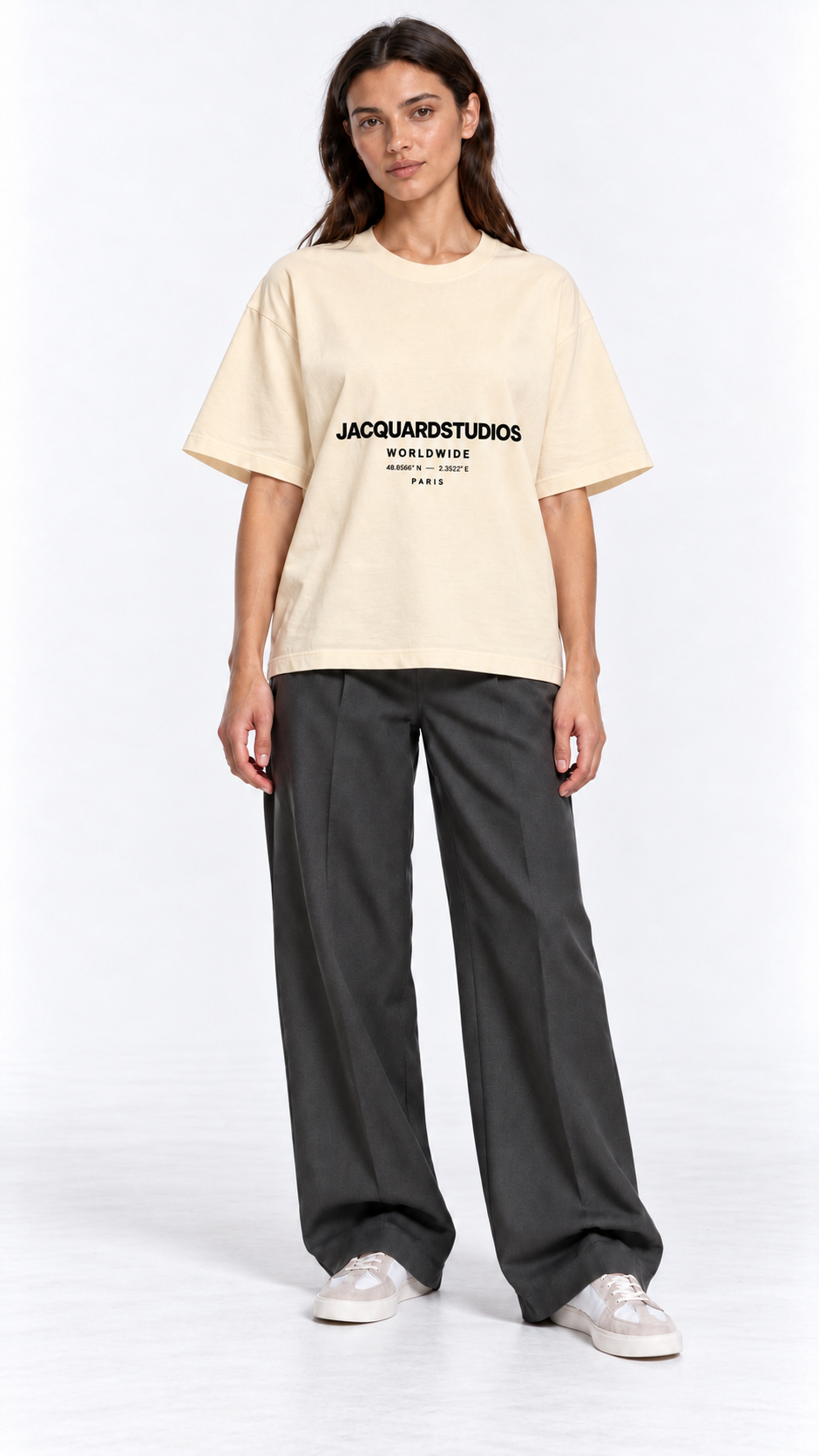 Front view of a second model wearing the JacquardStudios Worldwide T-Shirt in Apricot