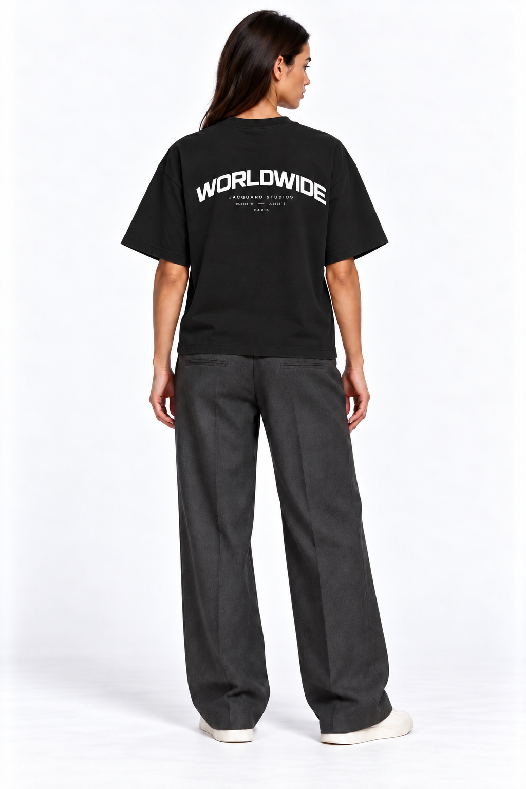 Back view of a second model wearing the JacquardStudios Worldwide T-Shirt in Black