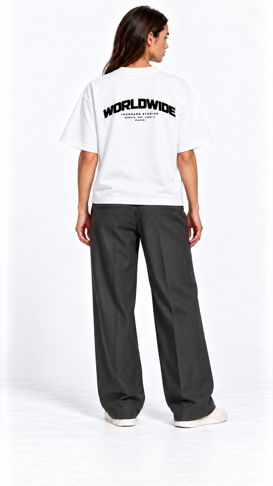Back view of a second model wearing the JacquardStudios Worldwide T-Shirt in White